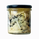 Śledź w marynacie cytrynowo - miodowej z czarnuszką Premium - słoik 300 g